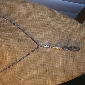 Silver tone necklace with Tassel